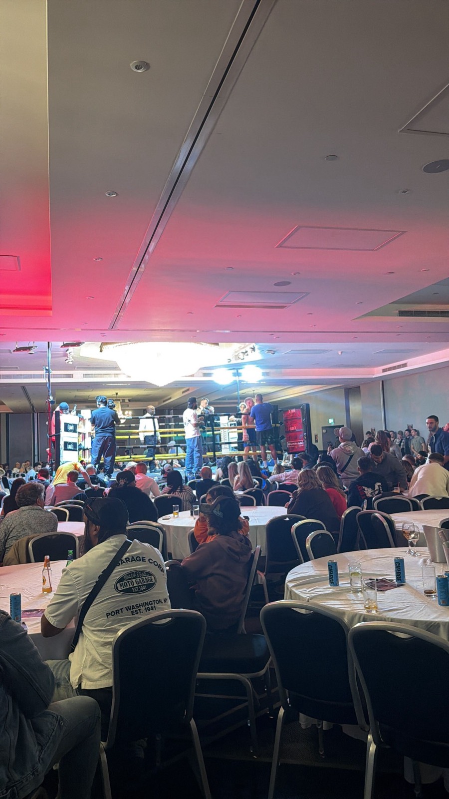 Boxing night with ringside tables in a hotel ballroom
