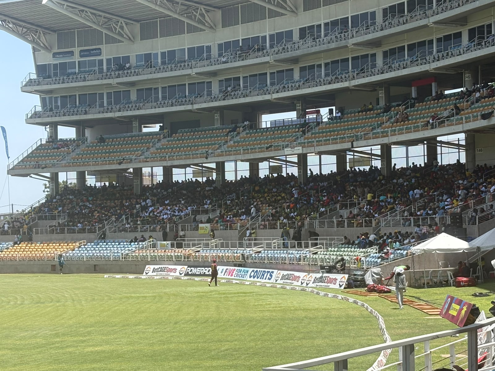 Cricket fans filling the lower tier of the stand at Sabina Park